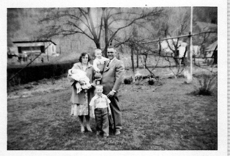 Marge Davis holding daughter JoAnn her husband Zeke holding son