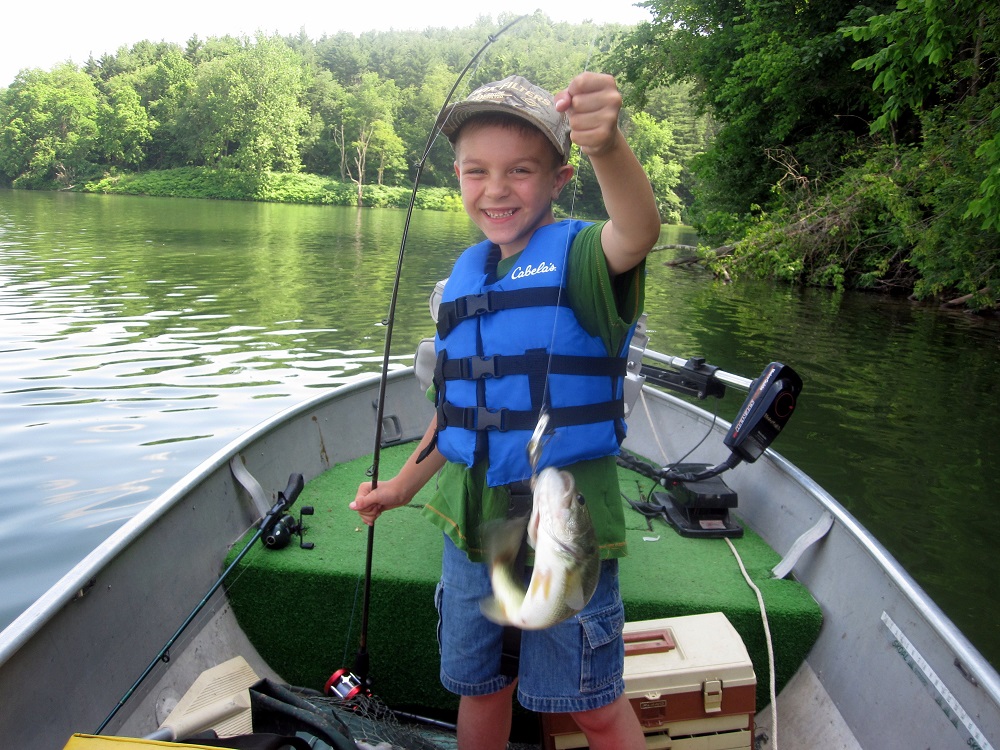Seth Krocker's first time fishing in a boat at Clendening Lake.  With Grandpa Ed Krocker Jr.